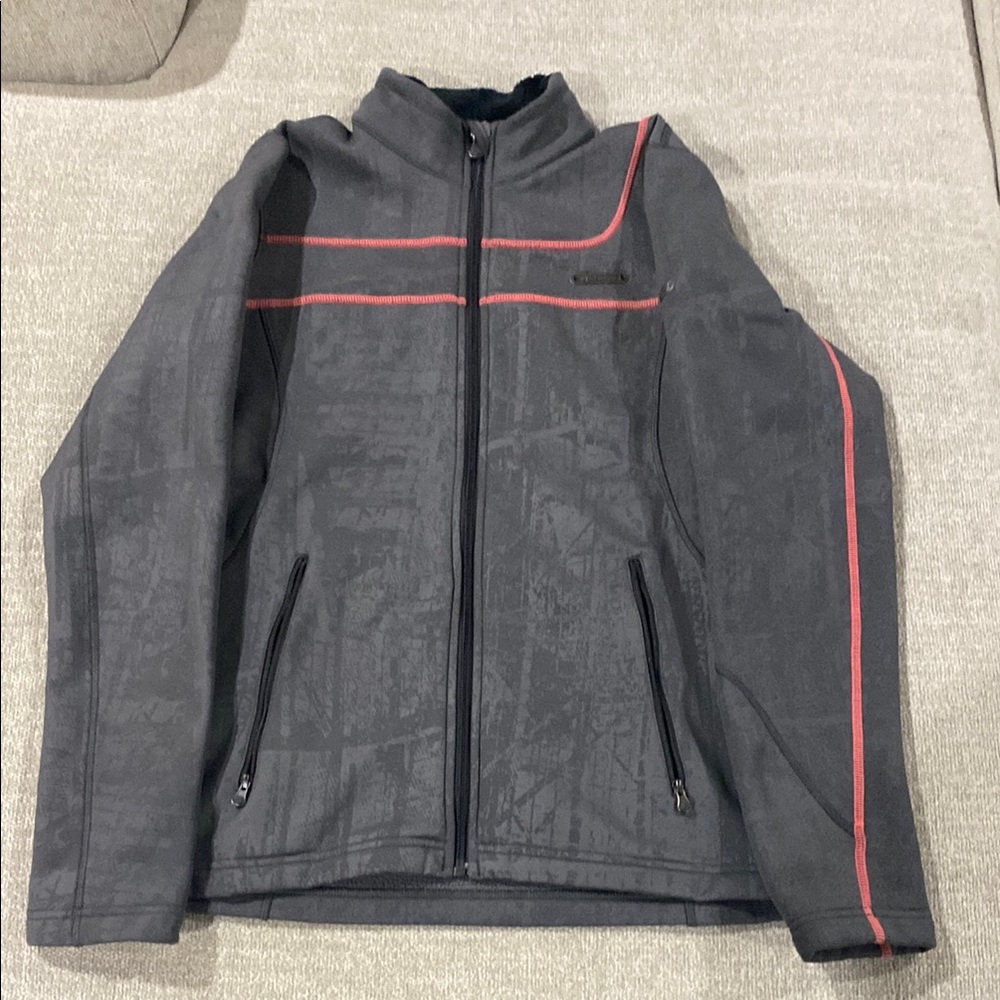 Woman’s Under Armor Grey and Pink Jacket